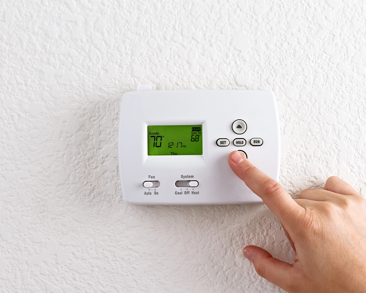 Solutionfinders what does hold mean on a thermostat and when to use it